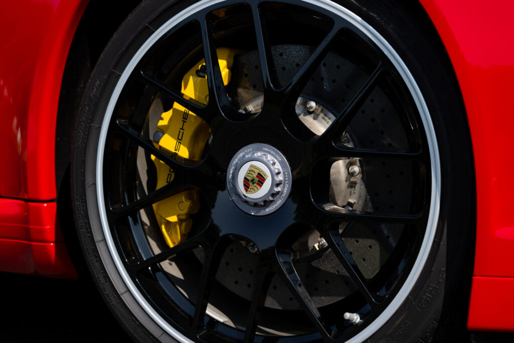 Black option wheels on a 2012 Porsche 911 Turbo S for sale in New Hampshire