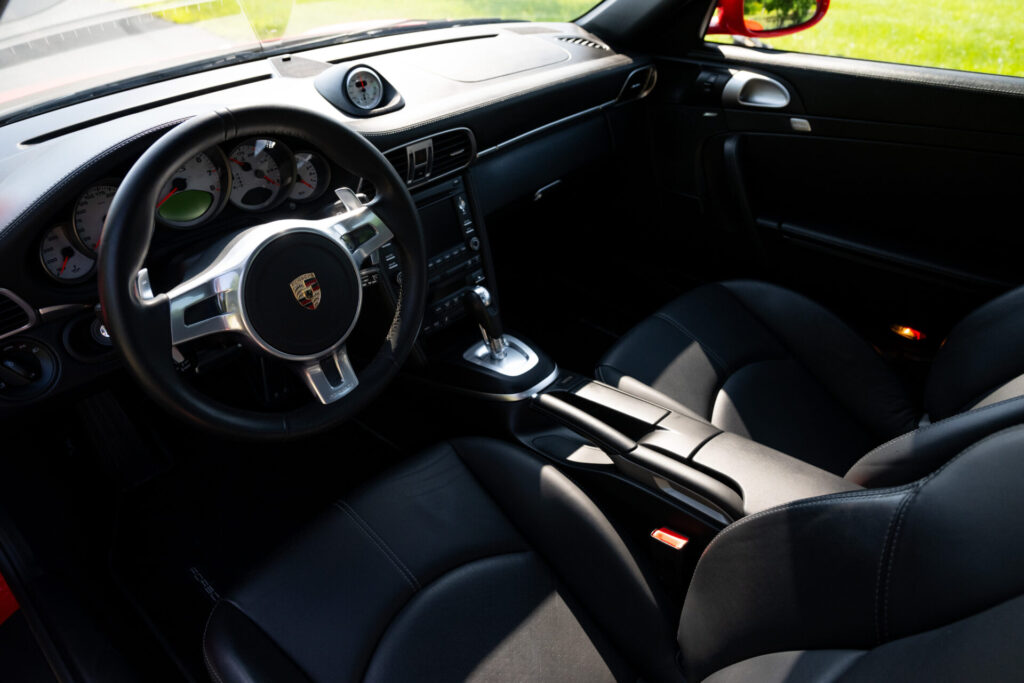 Black leather interior trim on a 2012 Porsche 911 Turbo S for sale in New Hampshire